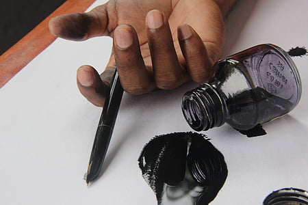person holding fountain pen and ink thumbnail