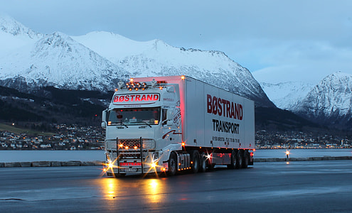 white Bostrand transport on the road thumbnail