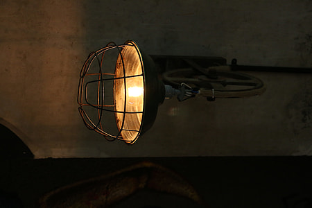 turned-on black and orange lamp thumbnail