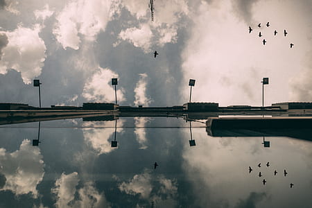 Reflection of Clouds in Sky thumbnail