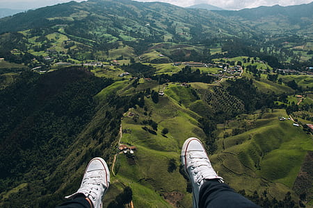 person above rolling hills thumbnail