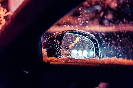 Car Rear-View Side Mirror in Snowy Weather thumbnail