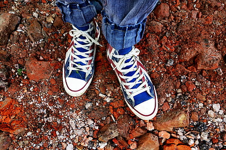 person standing on brown soil thumbnail