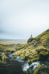 man standing on cliff thumbnail
