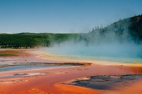 lava covered body of water near the forest thumbnail