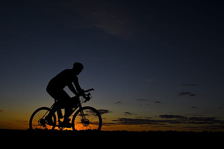 silhouette photo of biker thumbnail