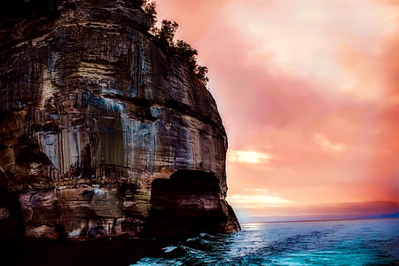 rock formation near sea painting thumbnail