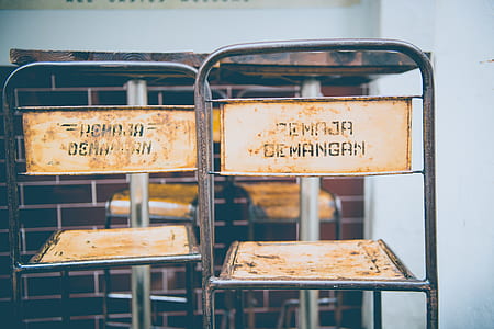 two white steel chairs thumbnail