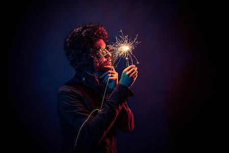 man holding firework thumbnail