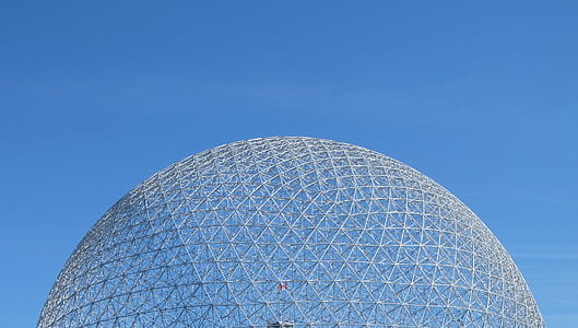 concrete building under blue sky thumbnail