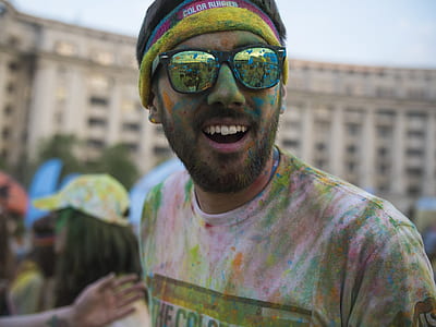 man wearing color fun run shirt thumbnail