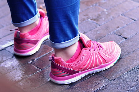 pair of pink-and-white running shoes thumbnail