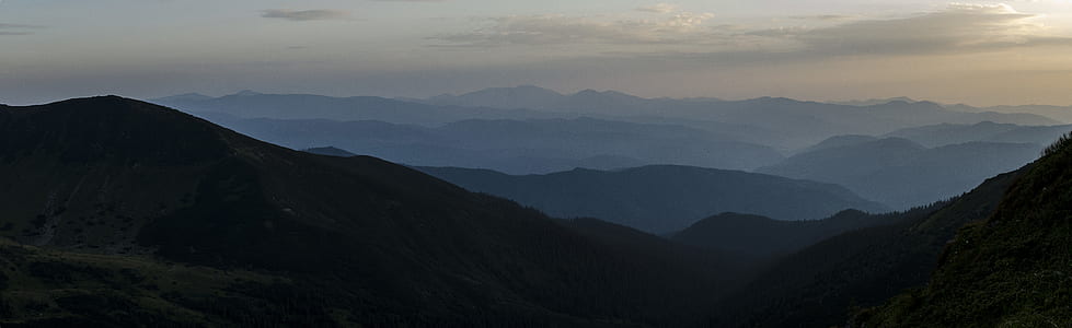 mountain under cloudy sky thumbnail