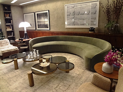 gray fabric sectional sofa with coffee tables and table lamp turn on thumbnail