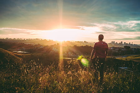 Man Standing on Green Grass thumbnail