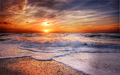 seashore and ocean sunset photo thumbnail