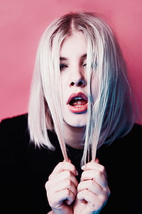 woman wearing black crew-neck top thumbnail