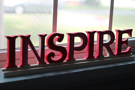 selective focus photography of inspire freestanding letters thumbnail