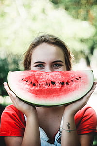 woman holding slice watermelon thumbnail