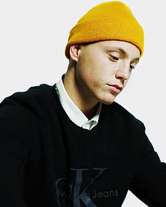 portrait photography of man in yellow beanie thumbnail