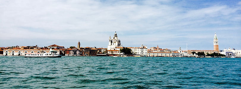 panoramic photo of white concrete buildings thumbnail