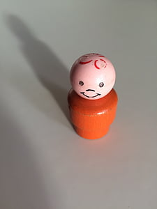 pink and brown wooden toy thumbnail