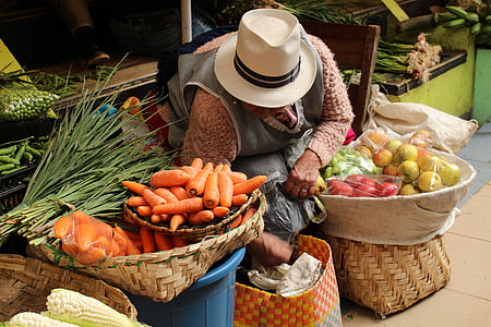 person selling vegetables thumbnail