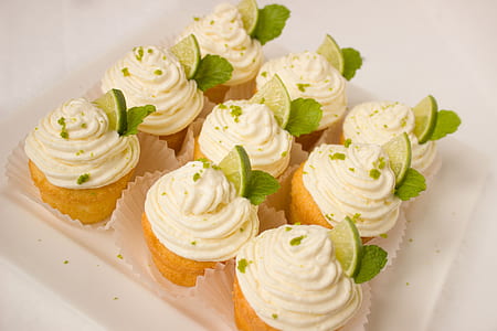 nine white icing covered cupcakes thumbnail