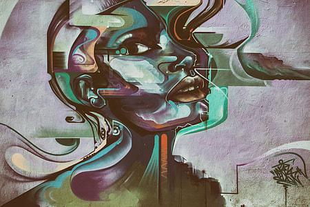 Vibrant street art portrait captured on a wall in Shoreditch thumbnail