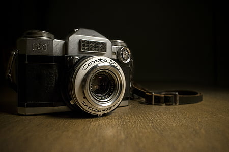 black and gray point-and-shoot camera thumbnail