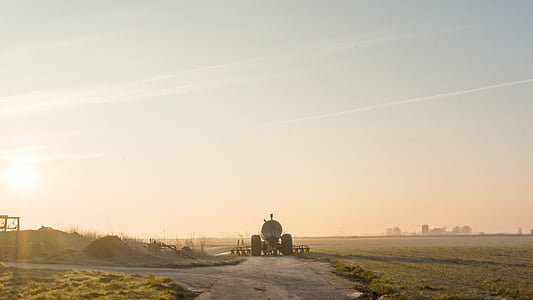 vehicle on road between field thumbnail