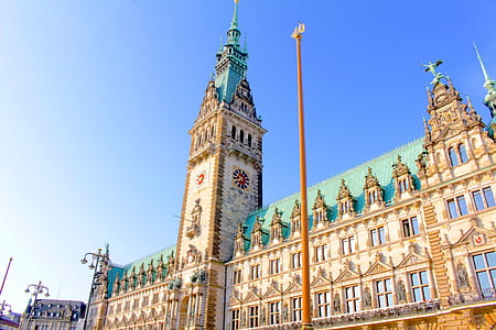 Brown and Teal Concrete Pointed Top Building thumbnail