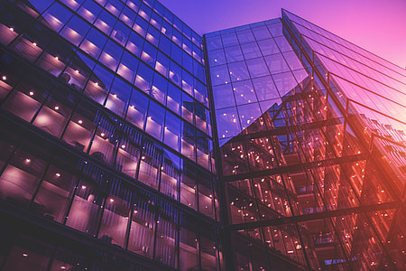 Glass office buildings and light reflections at sunset thumbnail