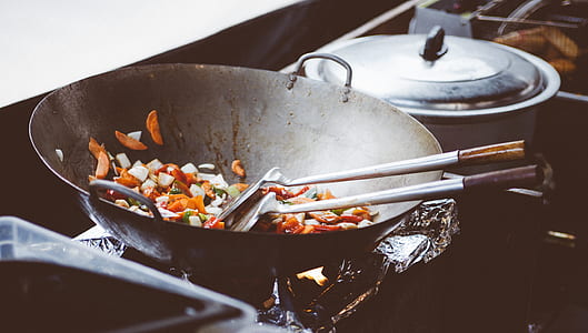 two spatula on black and gray wok thumbnail