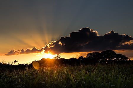 sun piercing through clouds thumbnail