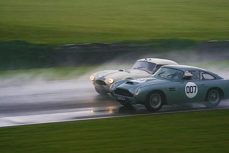 green and white racing cars racing thumbnail