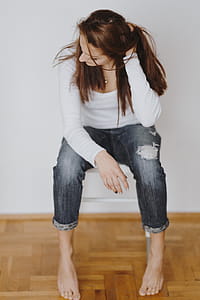 Beautiful young woman reading a book thumbnail