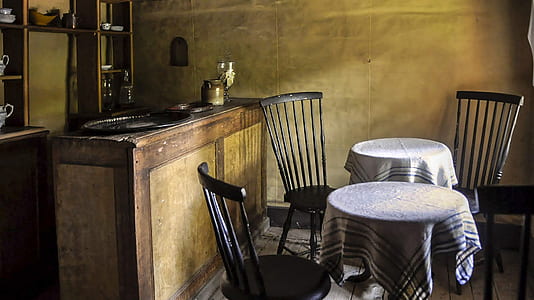 two tables with gray tablecloths thumbnail