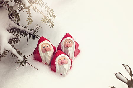 three Santa Claus figurines thumbnail