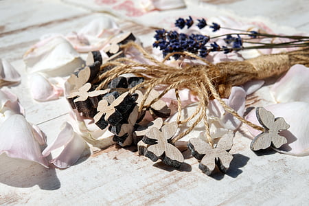 white petal flower near butterfly ornament decor thumbnail