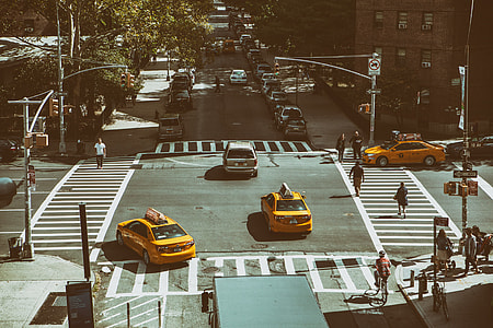 Wide angle shot of traffic at a junction in Manhattan, New York City. This image was captured from the High Line public walkway on the West of the island thumbnail