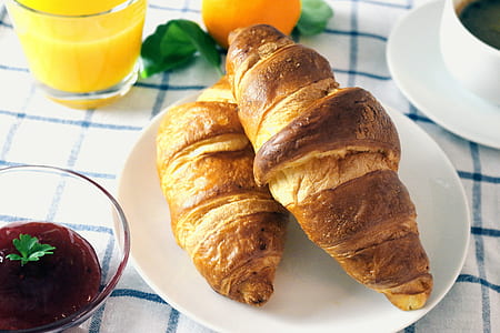two croissant breads on white saucer thumbnail
