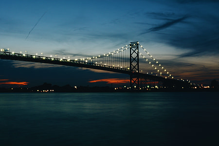 golden gated bridge lighted during nighttime thumbnail