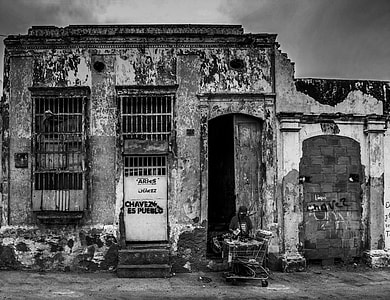 person standing in front of building thumbnail