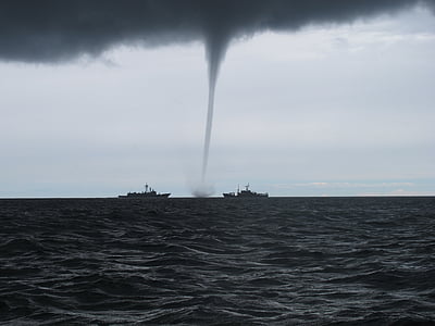 two black ship at sea near tornado thumbnail