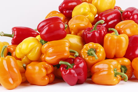 bunch of bell peppers on white surface thumbnail