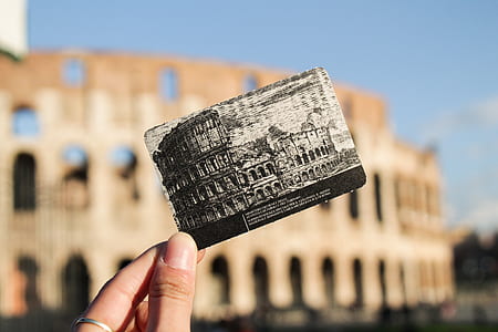 person holding gray card thumbnail