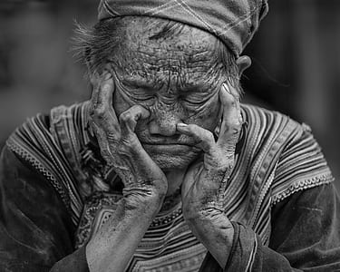 closed photography of woman leaning thumbnail