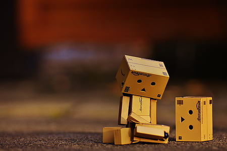 shallow focus photography of brown boxes thumbnail