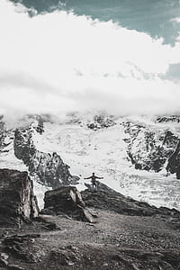 man standing on mountain thumbnail